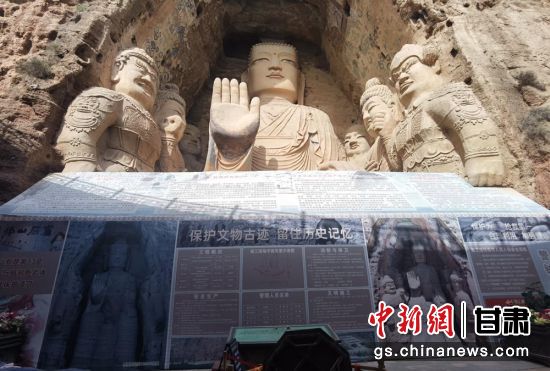 時(shí)下，中國(guó)“石窟鼻祖”天梯山石窟第13窟大佛足部與局部危巖體搶救性保護(hù)項(xiàng)目正在施工。圖為施工現(xiàn)場(chǎng)。陳曉斌 攝