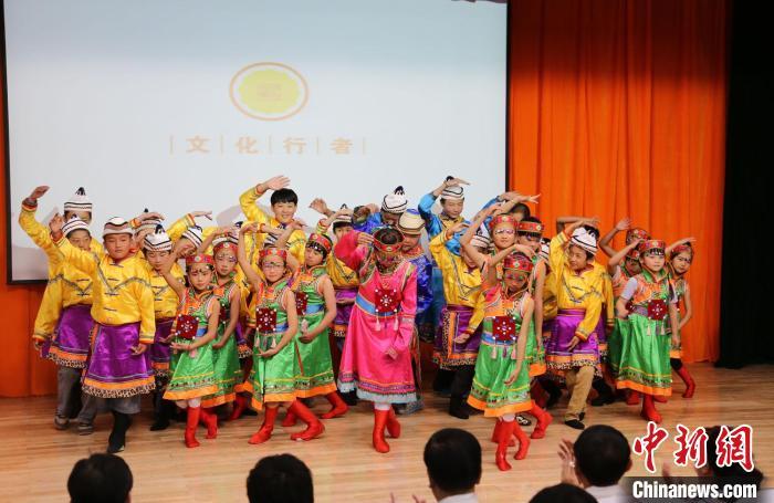 圖為蘭州大學(xué)文化行者團(tuán)隊走進(jìn)民族社區(qū)，開展系列活動。(資料圖)蘭州大學(xué)供圖